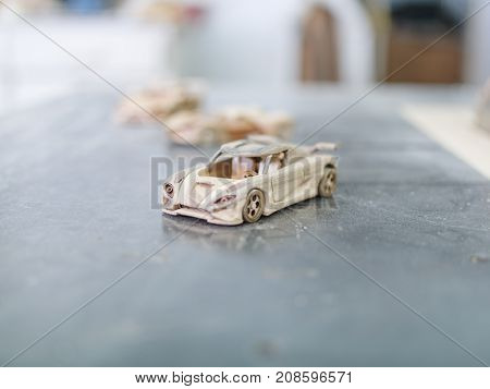 Wooden car made on a special car for cutting out of wood