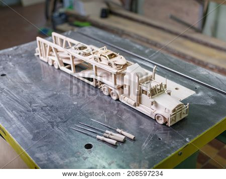 Wooden truck made on a special car for cutting out of wood