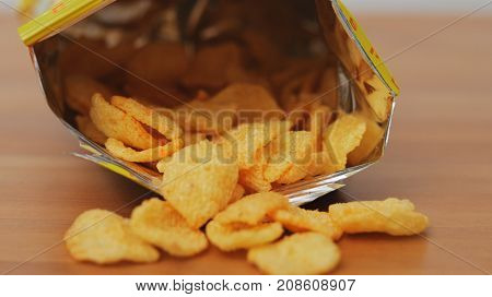 Eating Cheese crisp in package 