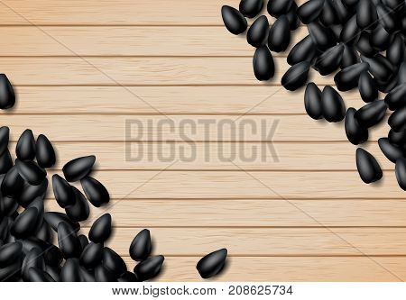 Sunflower seeds background with heap of scattered black grains