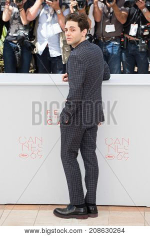 CANNES, FRANCE - MAY 19, 2016: Xavier Dolan attends the 'It's Only The End Of The World (Juste La Fin Du Monde)'  photocall during the 69th annual Cannes Film Festival at the Palais des Festivals 