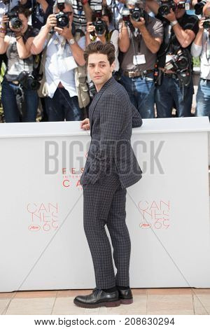 CANNES, FRANCE - MAY 19, 2016: Xavier Dolan attends the 'It's Only The End Of The World (Juste La Fin Du Monde)'  photocall during the 69th annual Cannes Film Festival at the Palais des Festivals 