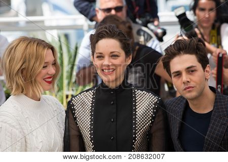 CANNES, FRANCE - MAY 19, 2016: L. Seydoux, M. Cotillard, X. Dolan attend the 'It's Only The End Of The World '  photocall. 69th annual Cannes Film Festival at the Palais des Festivals 