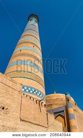 Islam Khodja Minaret at Itchan Kala. A UNESCO heritage site in Khiva, Uzbekistan