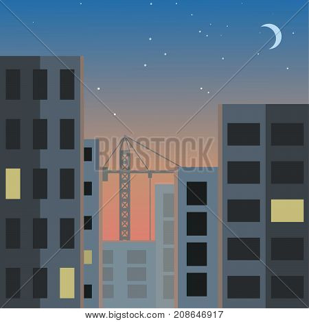 The city under construction on the background of the beginning of the night