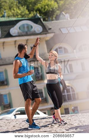Sports Couple Giving Highfive