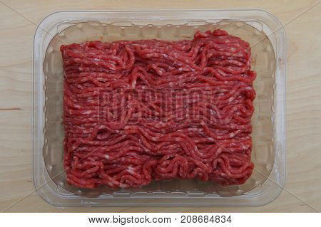 Raw Minced Meat in a Black Plastic Container