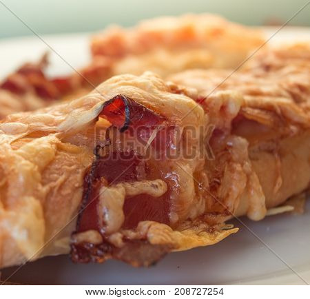Homemade Bacon and cheese bread stick close up