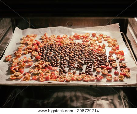 Rose hip and buck thorn drying in Oven