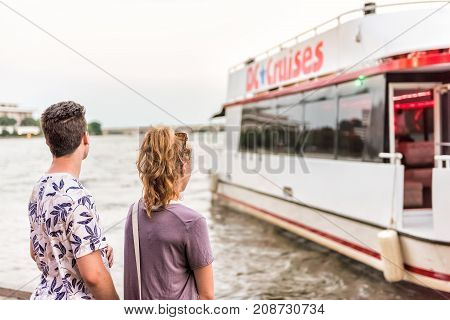 Washington Dc, Usa - August 4, 2017: Young Couple Standing In Georgetown Park On Riverfront In Eveni