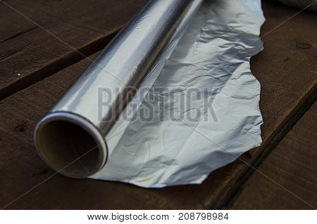 kitchen tools and utensils, aluminum foil used in kitchen, aluminum foil pictures in different concepts,