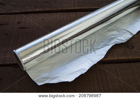kitchen tools and utensils, aluminum foil used in kitchen, aluminum foil pictures in different concepts,