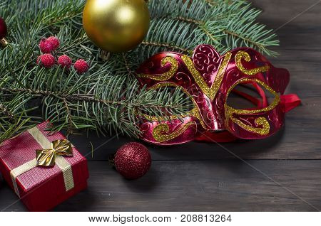 Red Christmas  Gift  Box With Red Ribbon And Fir Branches