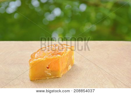 moon cake Chinese tradition dessert stuffed mushed durian slice for piece on chop block