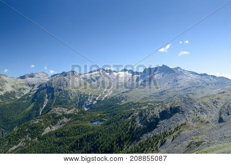 On the graukogel, Gastein mountains, Austria, Europe. Futuristic looking viewpoint and iron bridge for visitors and hikers.