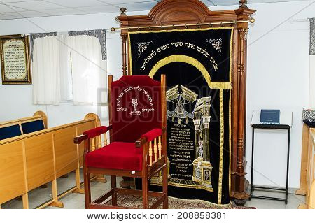 Moshav Tziparia Israel - October 13 . 2017: The interior of the synagogue in Moshav Tziparia . Israel . Designated congregation and the altar.