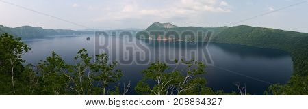 Mount Kamui and the beautiful clear blue Lake Mashu, Hokkaido, Japan