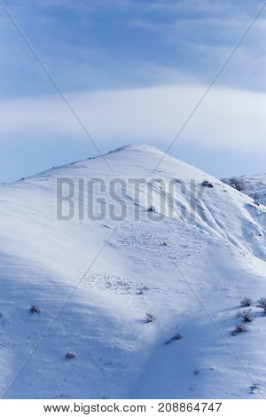 snowy slopes of the Tien Shan Mountains