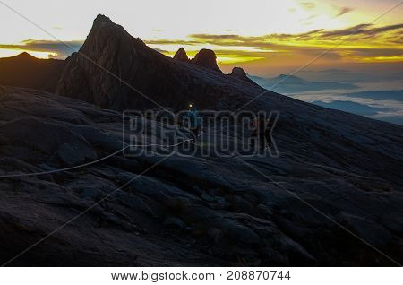 View from the top of Low's Peak of Mountain Kinabalu,Sabah during morning sunrise.Its the highest mountain in Malaysia is one of Borneo's most popular tourist attractions & climbers.