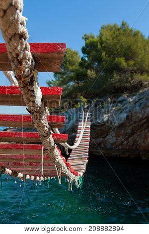 Old bridge made out of wood and rope