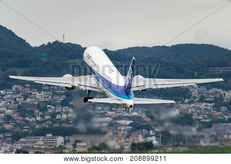 OSAKA, JAPAN - AUG. 14, 2017: Boeing 767-300 taking off from the Itami International Airport in Osaka, Japan.