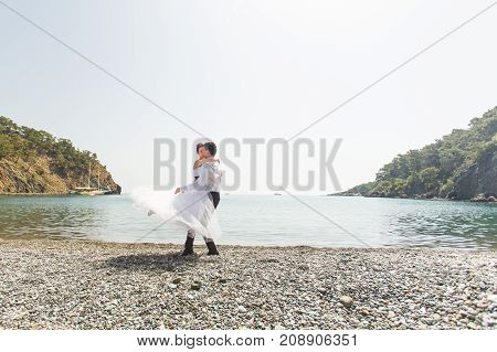 Romantic dating. Young loving couple embracing on nature.