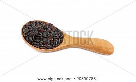 Black Purple Raw Rice In Wooden Scoop On White