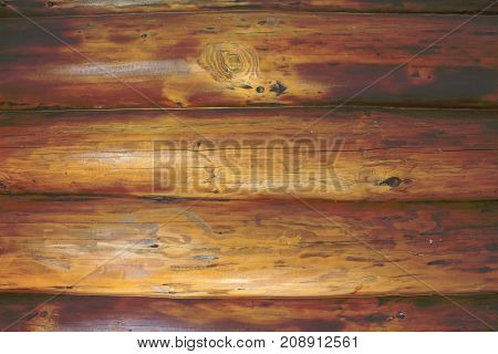 Background of horizontal hewed smooth wooden logs. modern log house indoor.