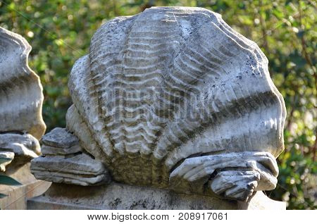 THUNDERBOLT, GA - October 8, 2017 A rippled clam shell graces grave at Bonaventure Cemetery.