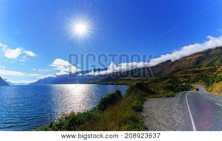 Panoramic image of beautiful backlit of Lake Wakatipu South Island of New Zealand