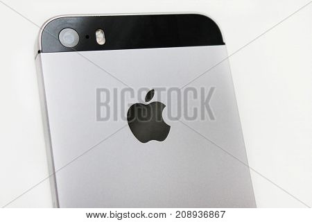MOSCOW, RUSSIA - OCTOBER 9, 2017: Apple iPhone SE Space Gray isolated on white. Apple is an American technology company, sells electronics and computer software. Close up image of famous Apple iPhone