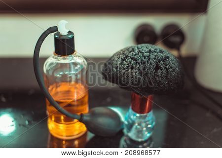 The Tools Of A Barber On The Desktop In Front Of The Mirror