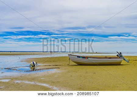 Boats in the Provincetown Coast at low tide MA USA