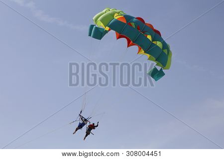 Paraglider With A Saddle For People. Parasales - Water Parachutes. Bright Colours.