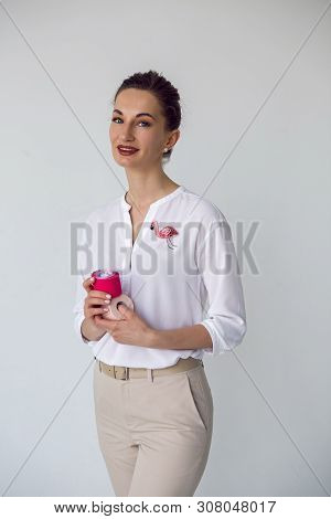 Young Attractive Beautician Aesthetician Woman In White Shirt
