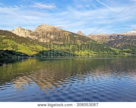 Bockmattlistock And Schiberg Mountains Above The Valley Wagital Or Waegital And Alpine Lake Wagitale