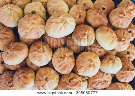 Preparation Of Belyashes. Traditional Russian Meat Pies Belyashi. Belyashes On A Table. Russian, Bas