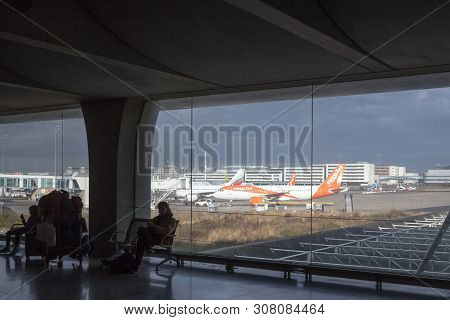 Paris, France - November 2, 2018: Passengers Waiting To Board Planes With An Airbus A319-100 Of Easy