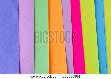 Blue, Pink, Yellow, Purple, Green, Orange Neon Paper Color For Background. Striped Geometric Pattern