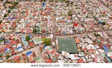 Streets Of Poor Areas In Manila. The Roofs Of Houses And The Life Of People In The Big City. Poor Di