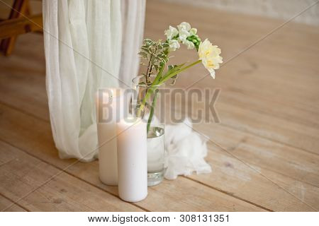 Branch Of Blooming White Peony Tulip Mattiola Branch In A Glass Vase White Wax Candles Stand On The 