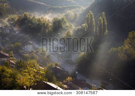 Aerial View Of Beautiful Foggy Village Between Mountains In Lovech, Bulgaria. Misty Sunrise View Of