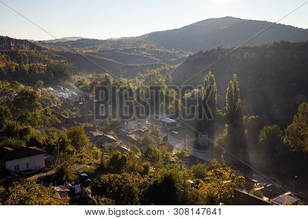 Aerial View Of Beautiful Foggy Village Between Mountains In Lovech, Bulgaria. Misty Sunrise View Of