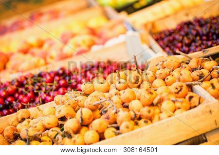 Loquat Fruit Or Japanese Medlars For Sale On Fruit Market