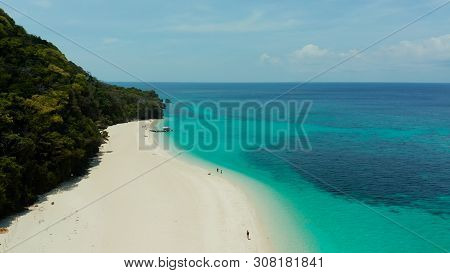 Tropical Landscape: Sandy Beach With Palm Trees And Turquoise Waters Of The Coral Reef Top View, Puk