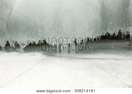 Slots Of Little Thin With Tiny Icicles Dripping Spring