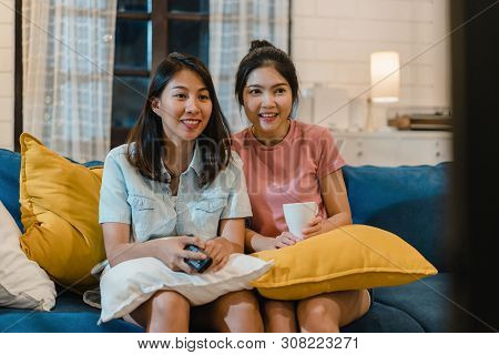 Lesbian Lgbt Women Couple Watching Television At Home, Asian Female Lover Feeling Happy Funny Moment