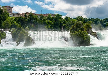 Neuhausen Am Rheinfall, Switzerland - 23 July 2019. Waterfall On The River Rhine In The City Neuhaus