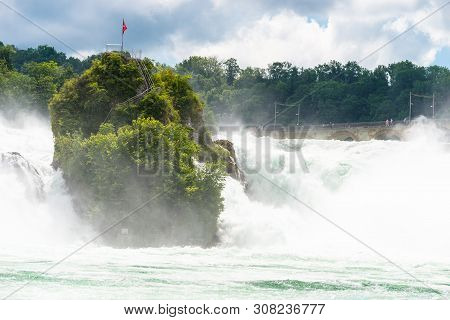 Neuhausen Am Rheinfall, Switzerland - 23 July 2019. Waterfall On The River Rhine In The City Neuhaus
