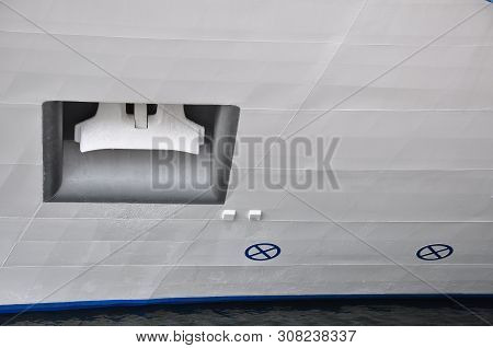 Fragment Of White Hull With Anchor Pillow (anchor Lining), On The Water.